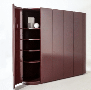 Polyester high-gloss red lacquer cabinet with curved sides by Laura Meroni — luxury yacht interior single gloss accent