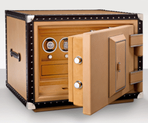 Leather-clad luxury safe with stitched trim and nickel hardware — Döttling “Gatsby” — discreet secure storage for a yacht owner’s suite.