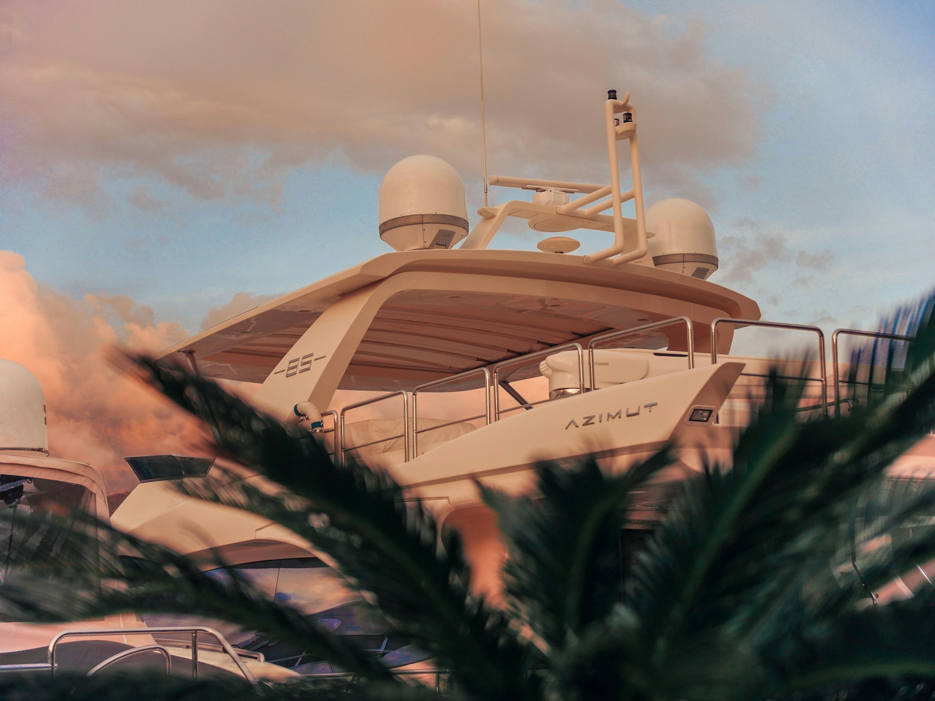 luxury motor yacht at sunset — what is APA in yacht charter explained