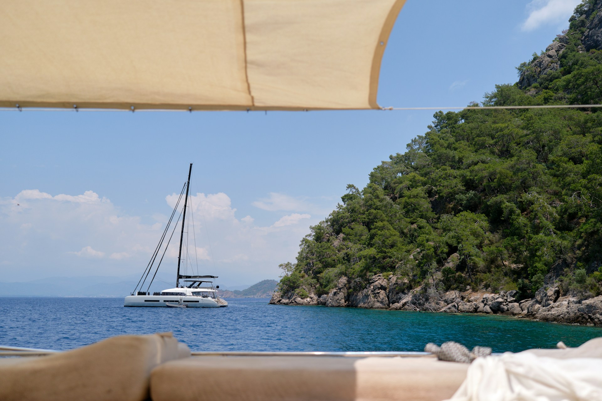 superyacht cruising on open sea illustrating yacht charter cost breakdown