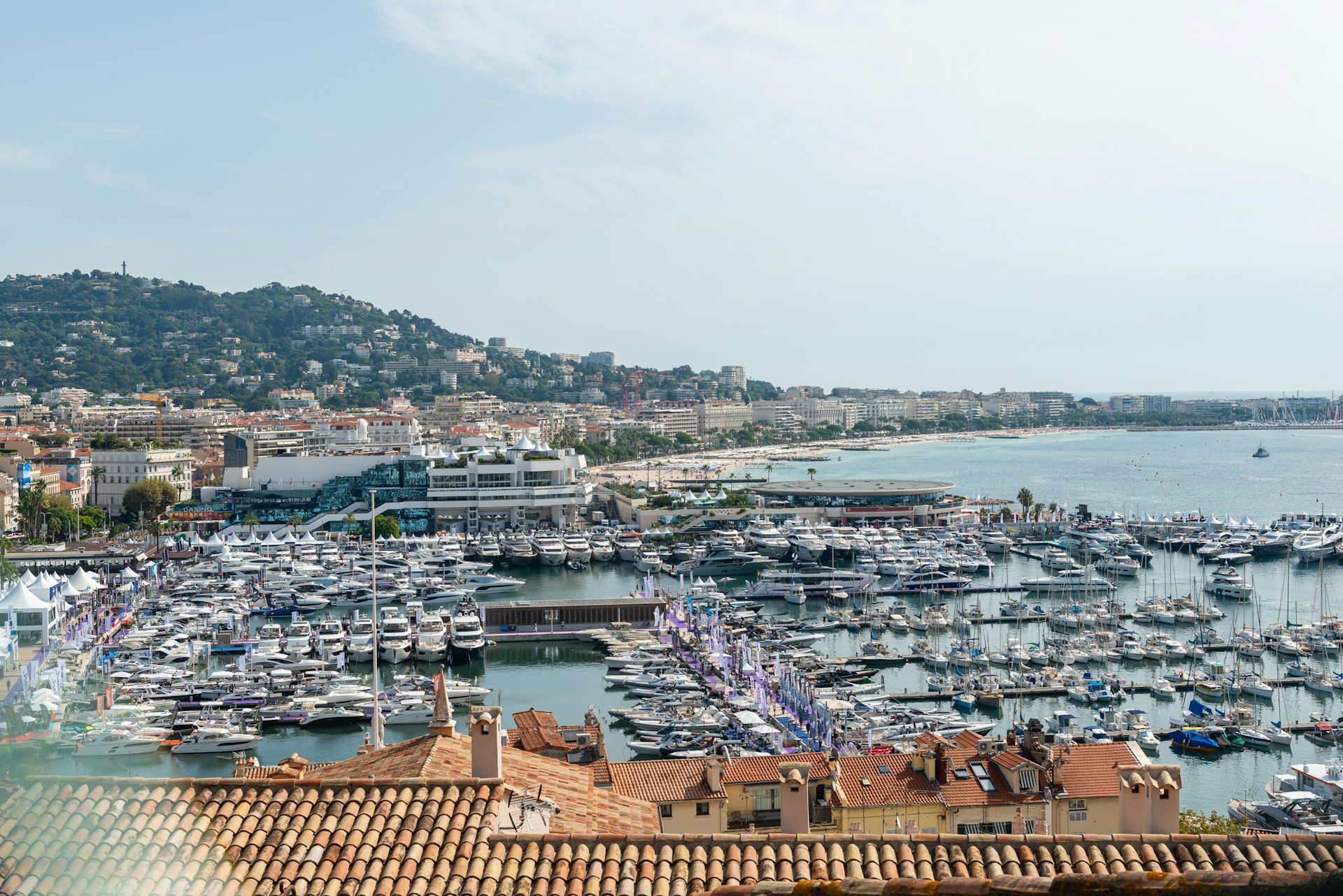Cannes Yachting Festival at Vieux Port with dense yacht berths and exhibition tents along the harbour