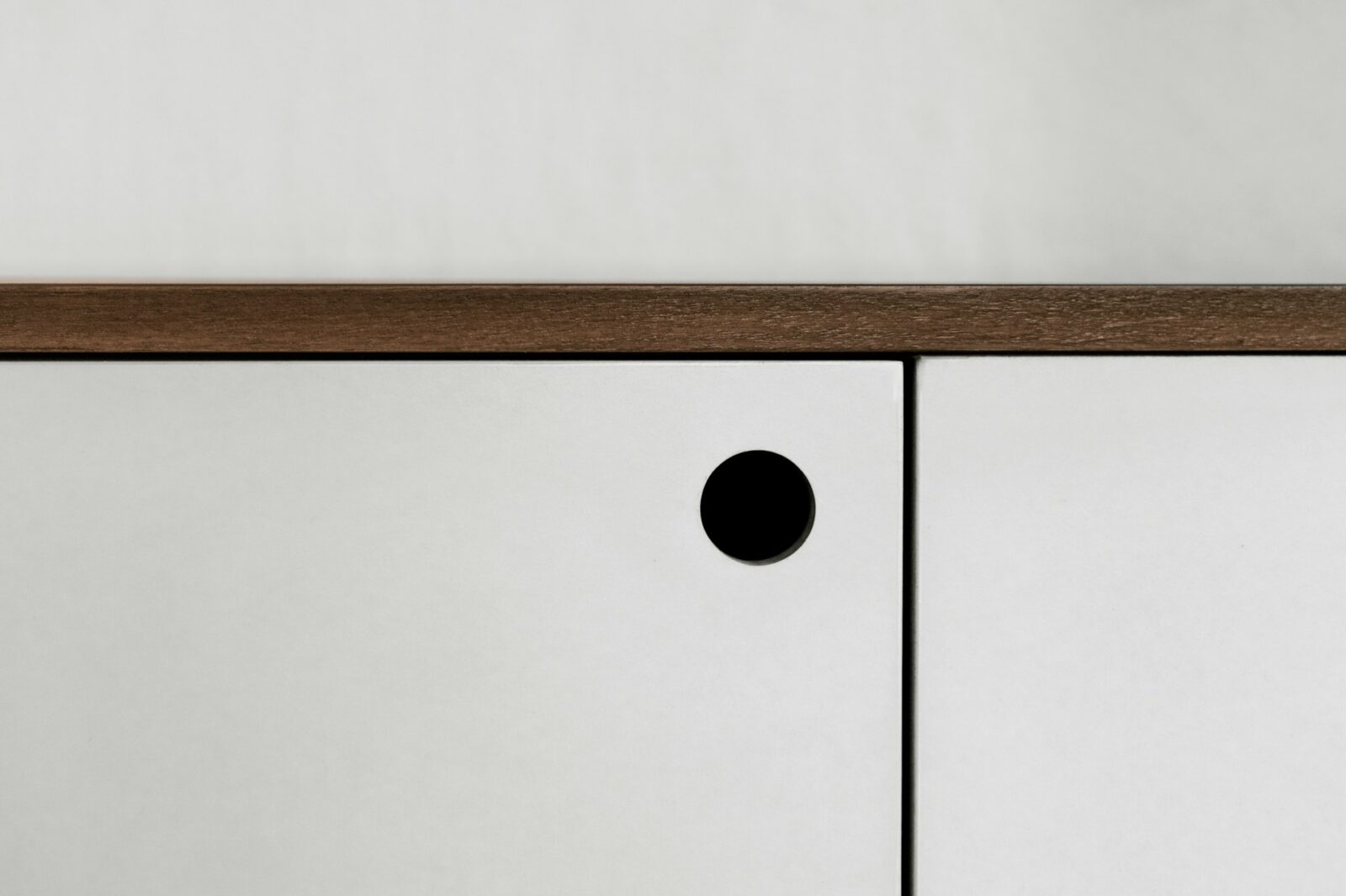 Minimalist cabinet detailing illustrating precision and restraint in yacht refit design