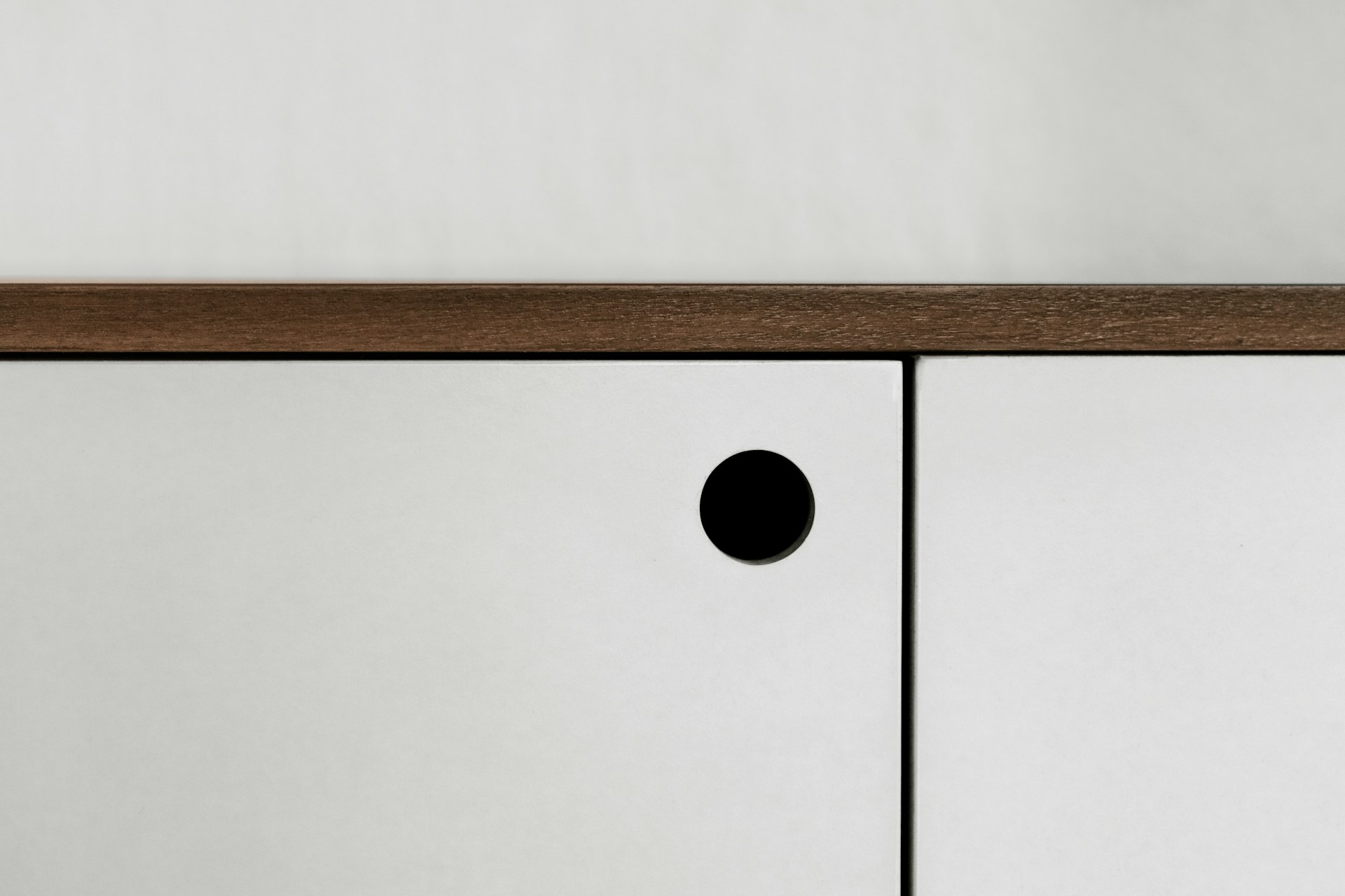 Minimalist cabinet detailing illustrating precision and restraint in yacht refit design